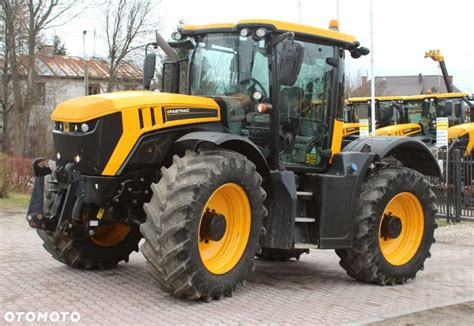 Schemat mocowania maszyny JCB Fastrac na przyczepie transportowej