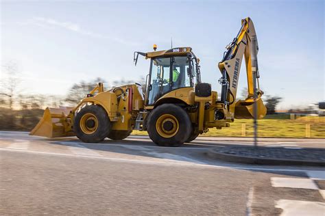 Thematic photo of Hydrema backhoe loader working on a construction site