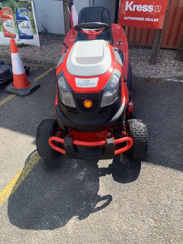 The Wolf-Garten Expert 92.160 H garden tractor on a lawn, showcasing its design and robust frame.