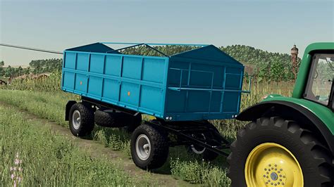 Thematic photo of an HL 8011 or HW 8011 tipper trailer working in a field