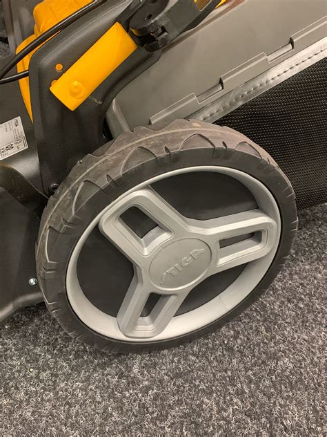 Photo of all standard accessories included with a Stiga lawnmower
