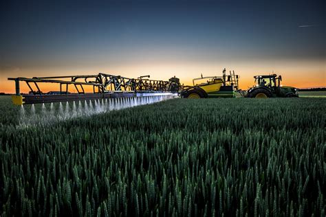 Thematic photo of a large trailed sprayer working in a field