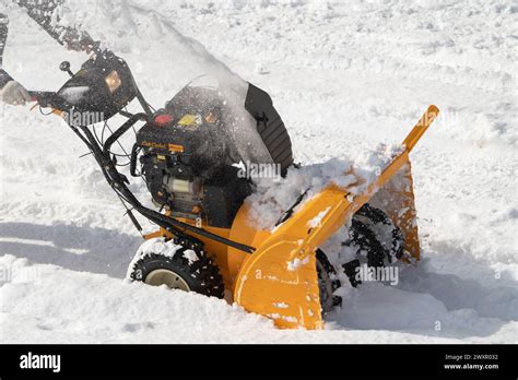 Thematic photo of a Romet Home Edition 2 snow blower clearing snow