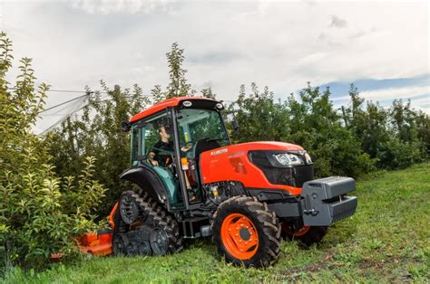 zdjęcie ciągnika sadowniczego Kubota M5091 Narrow Power Crawler z gąsienicami