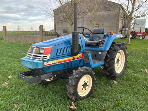 Thematic photo of an Iseki Landhope tractor in a field