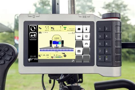 Zdjęcie terminala operatorskiego IsoMatch Tellus lub Focus 3 w kabinie ciągnika