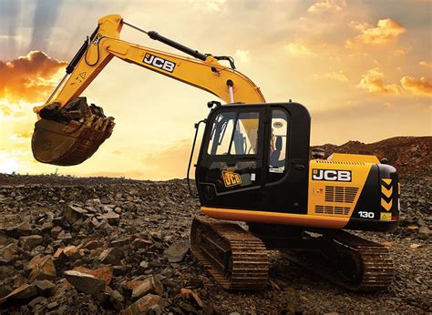 The JCB 130 excavator performing earthworks, highlighting its rotating superstructure.
