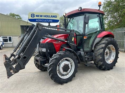 kolaż zdjęć różnych modeli ciągników o mocy do 70 KM: Case IH JX70, Zetor Proxima, Deutz-Fahr Agrolux, Farmtrac, Kubota M6060