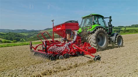 Thematic photo of a mounted seed drill combined with a cultivator working in a field