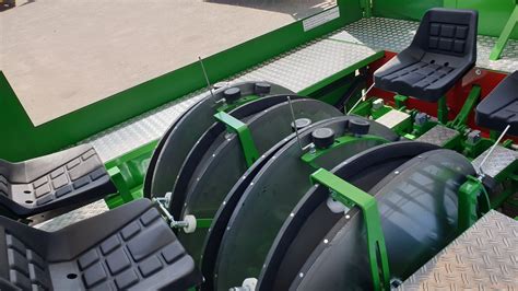 Technical drawing or infographic of a disc planter