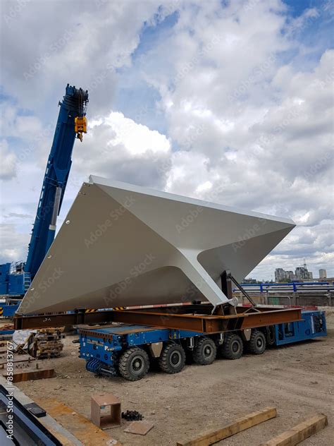 Thematic photo of a large self-propelled crane operating on a construction site