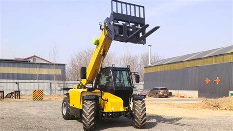 Diagram of a telescopic handler with its arm extended, showing reach and lift height
