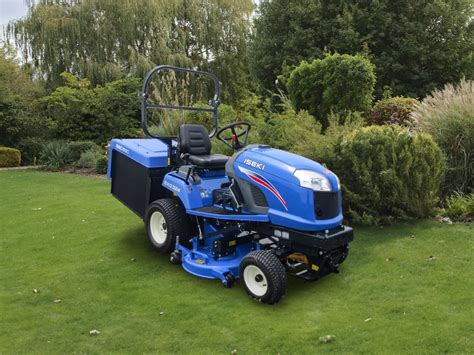 Iseki SXG 324 garden tractor with various attachments, demonstrating versatility.