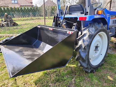 Zdjęcie używanego ciągnika Kubota lub Iseki w akcji