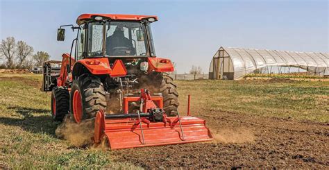 Thematic photo of a rotary tiller in operation on a field