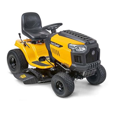 Traktorek ogrodowy w akcji, z logo MTD i Cub Cadet