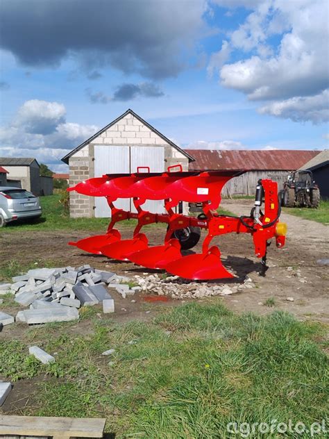 Schemat budowy pługa Akpil KM 180 z zaznaczeniem punktów regulacji