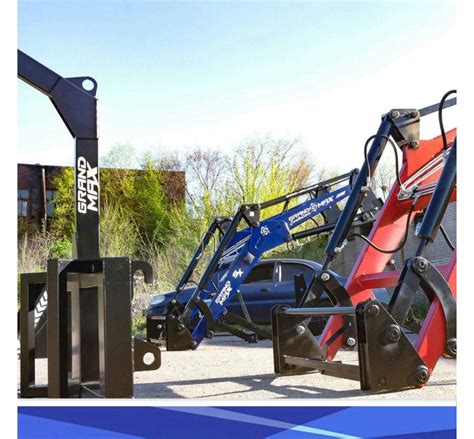 Zdjęcie ładowacza czołowego Kuhn Grand Max Evolution SX na ciągniku MTZ/YuMZ podczas pracy