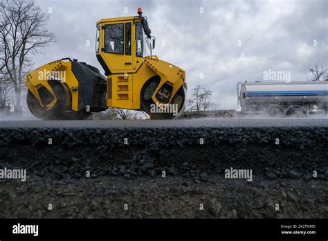 Thematic photo of a road roller working on a construction site