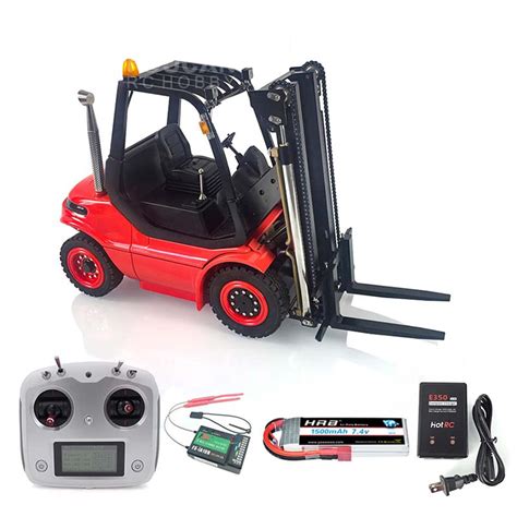 Thematic photo of an RC Linde forklift model in action, lifting a small pallet.