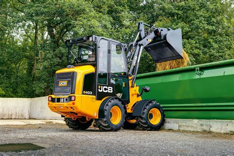 The JCB 403 compact wheeled loader at work