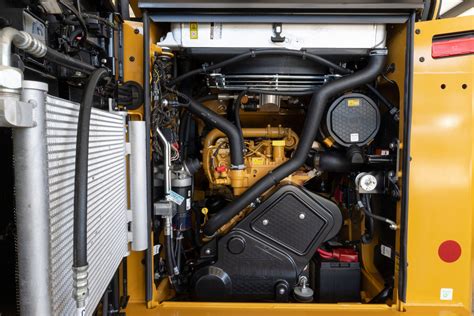 Engine compartment of a compact wheeled loader