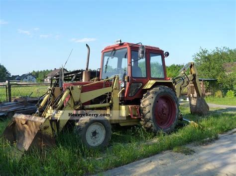 The MTZ 82 Borex backhoe loader working on a construction site