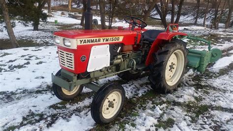 Yanmar YM1500 na tle gospodarstwa