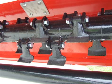 Close-up of innovative flail hammers with a thickened center