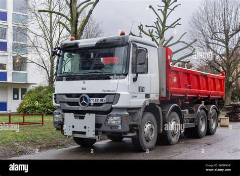 Thematic photo of a Mercedes Actros dump truck on a construction site