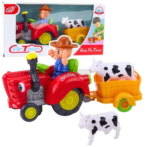 Zdjęcie zestawu Fisher-Price Little People Traktor z przyczepką i figurkami zwierząt na wiejskim podwórku