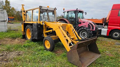 Zdjęcie koparko-ładowarki Ostrówek KTO-162 w akcji