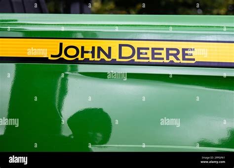 Logo John Deere i schemat kosiarki
