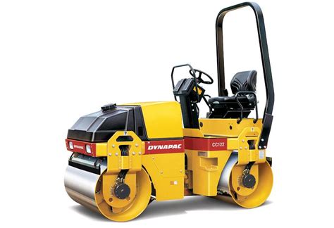 The Dynapac CC 122 road roller working on a small construction site or urban area