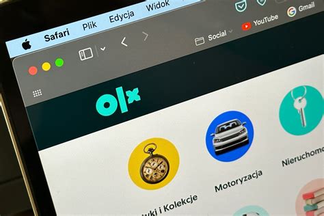 Zdjecie logo OLX na tle krajobrazu Strzelina z elementami maszyn budowlanych.