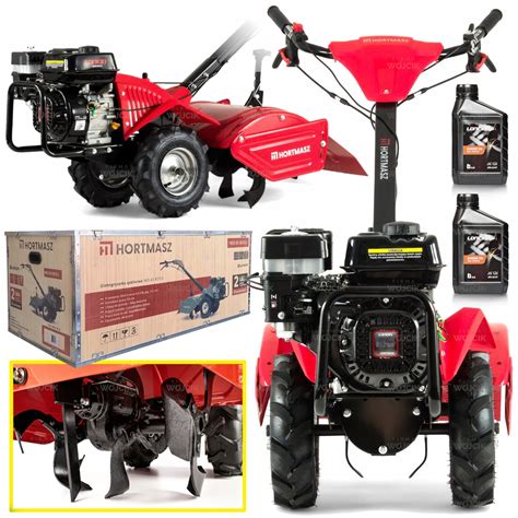 Zbliżenie na silnik Loncin i koła napędowe glebogryzarki.