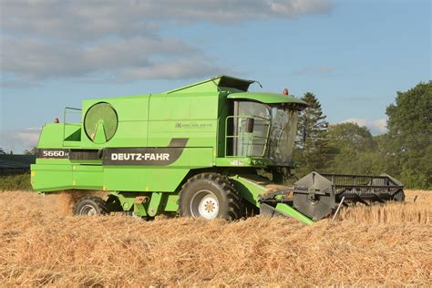 Deutz-Fahr C6305 TS combine harvester demonstrating its large grain tank capacity during harvesting operations.