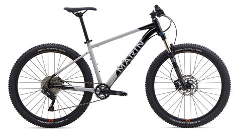 Thematic photo of Marin Bobcat Trail 5 mountain bike on a forest trail