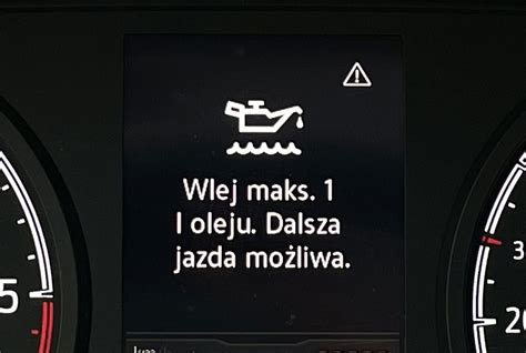Schemat wskaźnika poziomu oleju silnikowego w zagęszczarce DPU 6555 HE z zaznaczonymi poziomami MIN/MAX