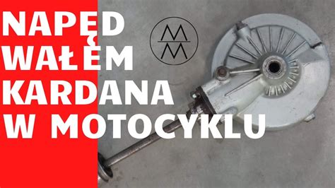 Infografika porównująca napęd paskowy z wałem Kardana w kosiarkach
