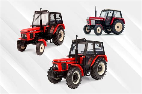 Zdjęcie przedstawiające różnorodne modele ciągników Zetor, od starszych po nowsze