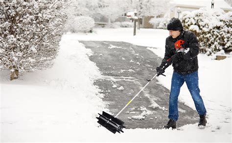 Thematic photo of NAC snow blower and sweeper on a cleared path