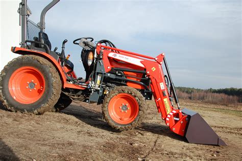 Thematic photo of a tractor with a front loader (TUR) working on a farm