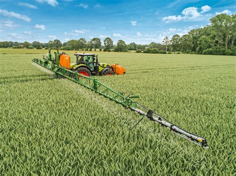 Thematic photo of Amazone UF field sprayer attached to a tractor