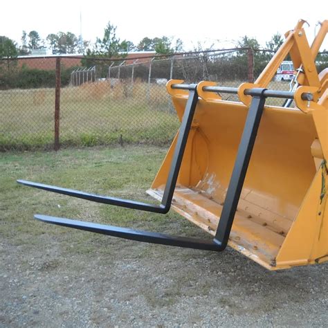 Photo collage showing various STOLL attachments (e.g., bucket, pallet fork, bale grab) in use.