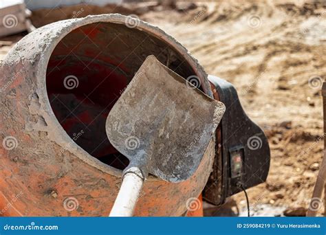 Thematic photo of a construction site with a concrete mixer in the foreground, showing the Podkarpackie region in the background.