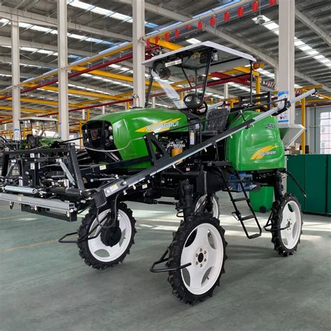 Agricultural sprayer with boom extended