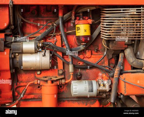 Engine compartment photo of a Renault 90-32 tractor showing the MWM engine