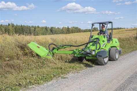 Thematic photo of a heavy-duty flail mower with a side arm attachment