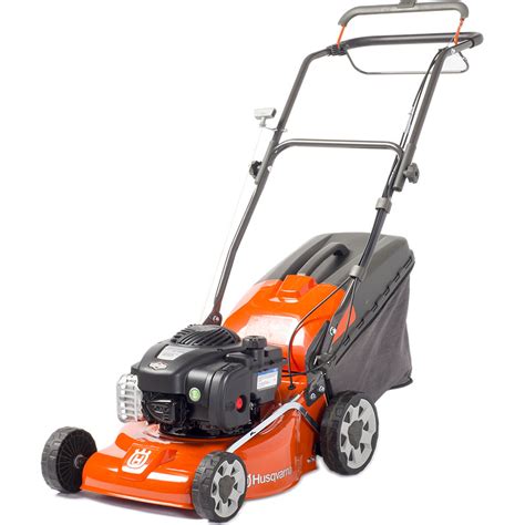The Husqvarna LC140S lawnmower in action on a green lawn, showing its compact size and user-friendly design.